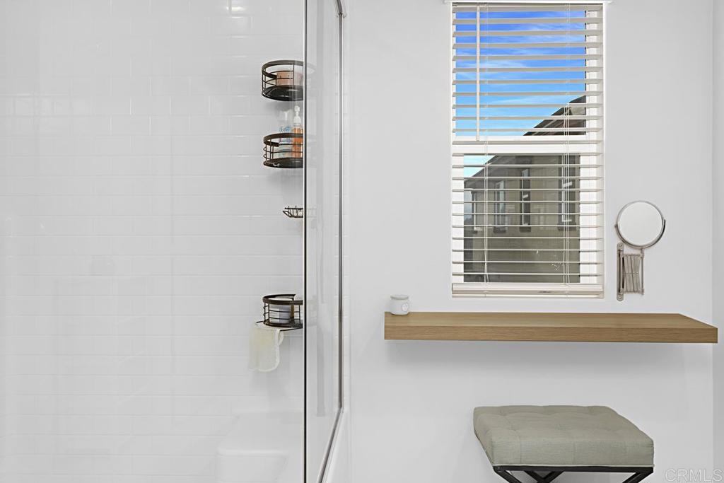 5410 Luna Way Bonsall, CA 92003 - Photo 31 of 37 a bathroom with a window and a shower