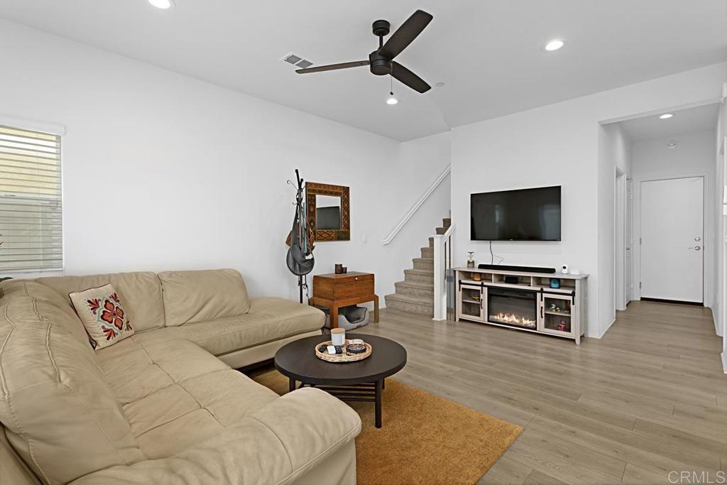 5410 Luna Way Bonsall, CA 92003 - Photo 7 of 37 a living room with furniture and a flat screen tv