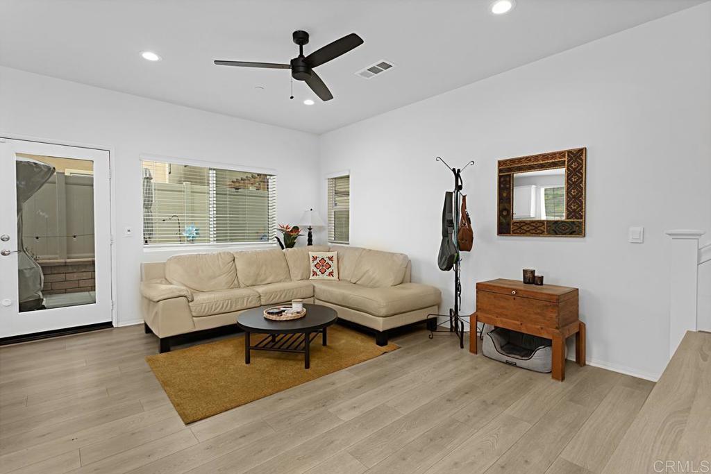 5410 Luna Way Bonsall, CA 92003 - Photo 9 of 37 a living room with furniture and a large window