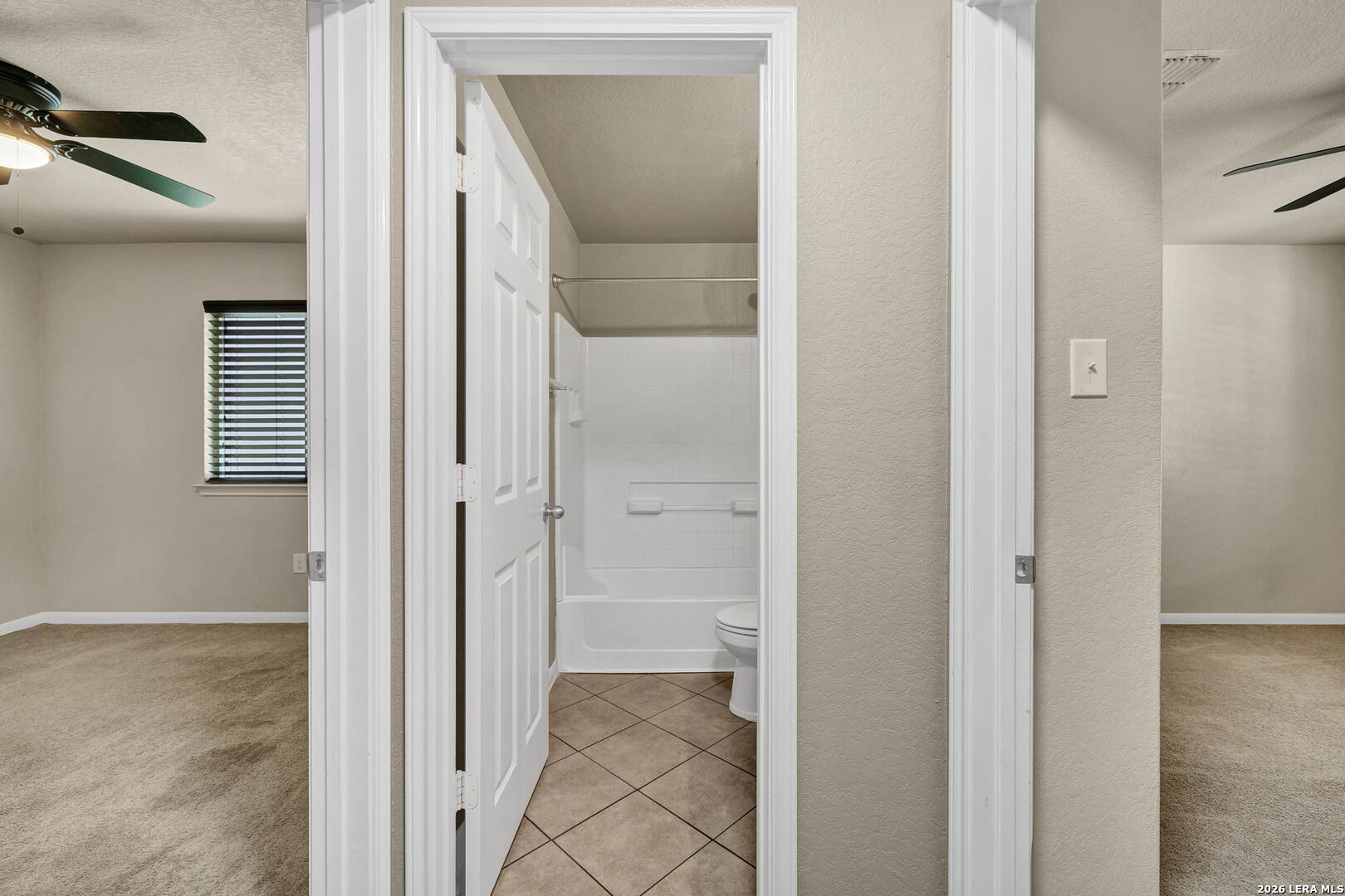4015 Shervin Way Converse, TX 78109 - Photo 29 of 43 a view of a bathroom from a hallway