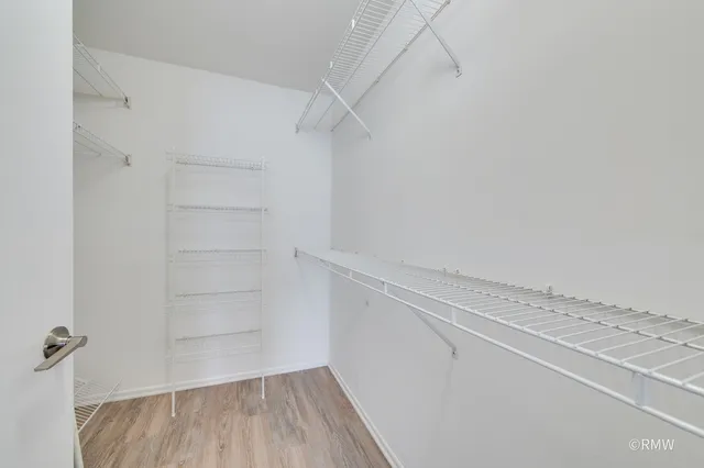 a view of a room with racks on the wall