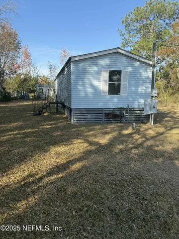 a front view of house with yard