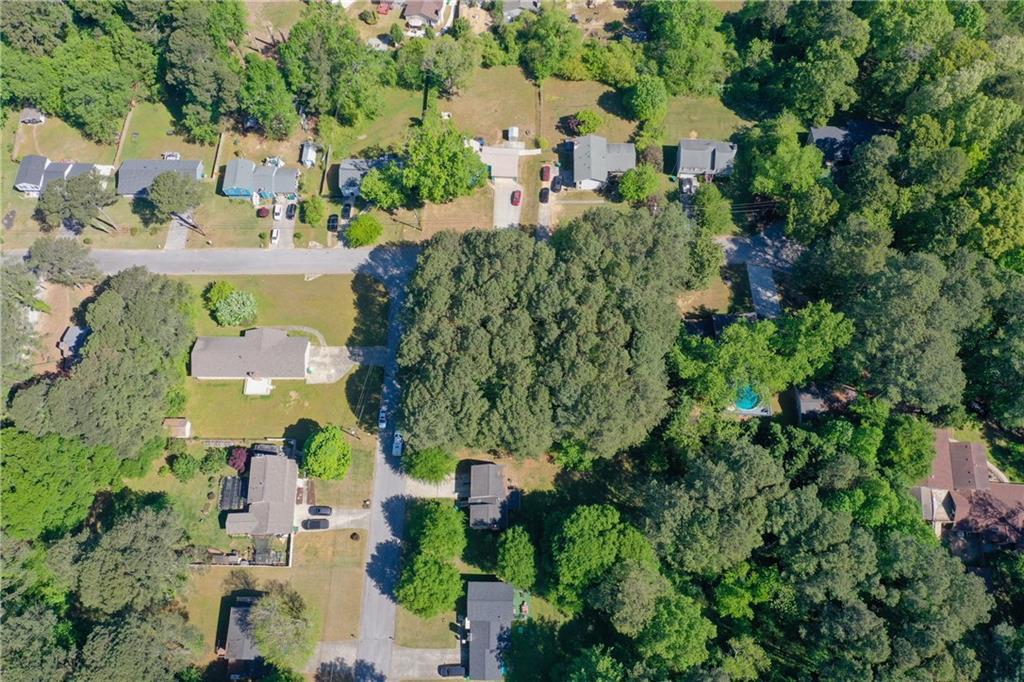 1250 Halter Lane Lithonia, GA 30058 - Photo 2 of 2 an aerial view of residential houses with outdoor space