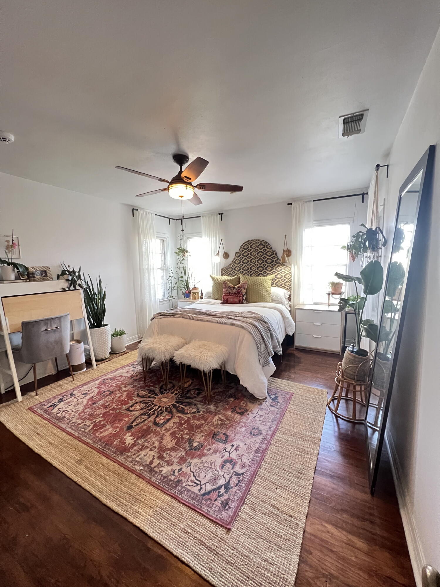 2111 23rd Street Lubbock, TX 79411 - Photo 6 of 15 a bedroom with a large bed and a couch