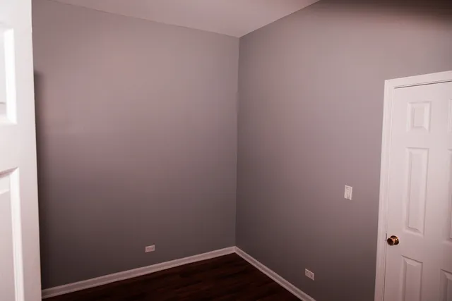 a view of small space with wooden floor