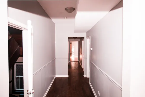 a view of hallway with stairs