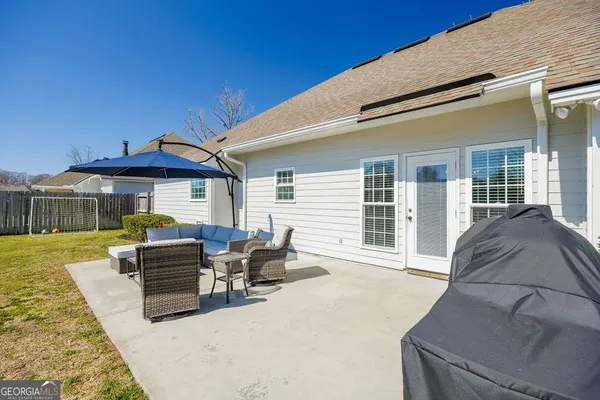 a front view of a house with patio
