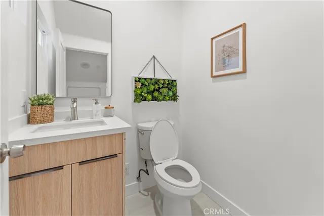 a view of a living room with a wooden floor