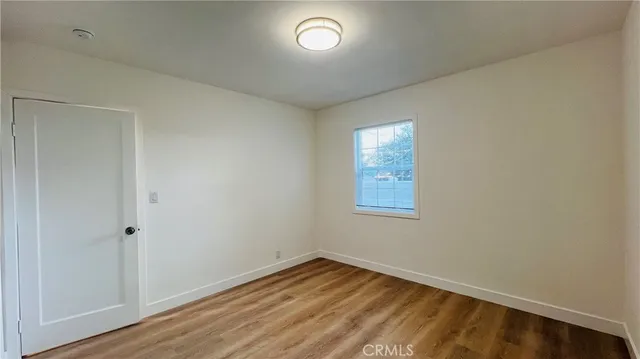 a view of a house with a yard and plants