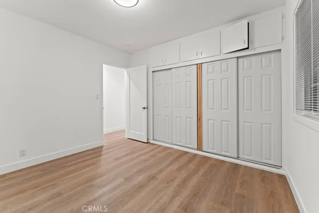 a bathroom with a sink vanity and toilet