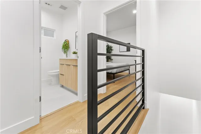 an aerial view of residential houses with green space