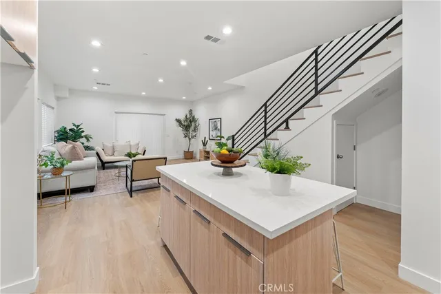 a bedroom with a bed and a cabinets