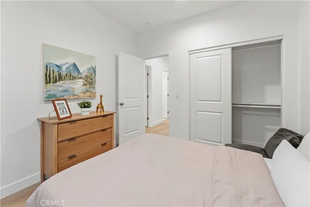 a view of a workspace with a potted plant and a window