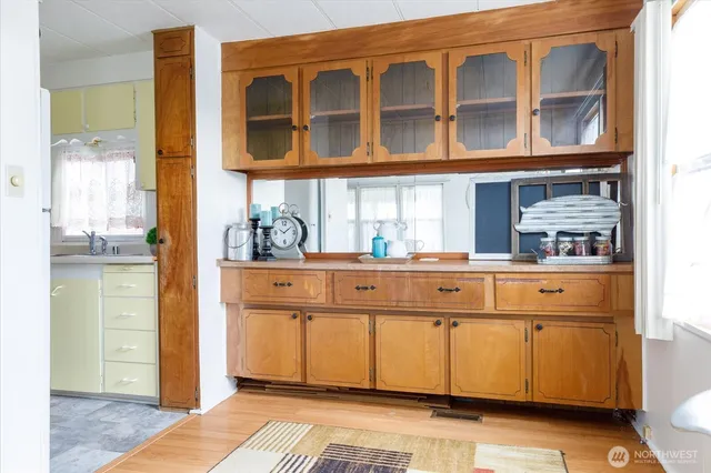 a kitchen with stainless steel appliances granite countertop a stove and a refrigerator