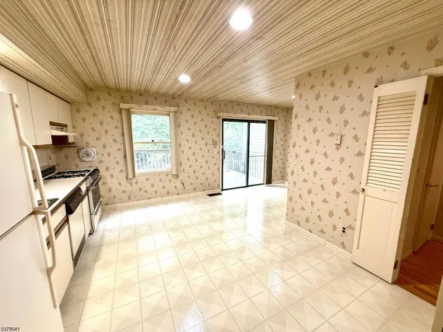 a view of a livingroom with a fireplace