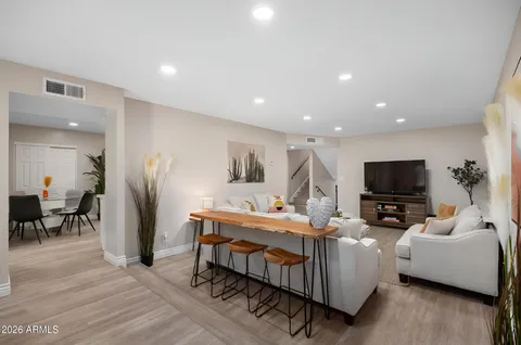 a bathroom with a sink toilet a mirror and shower