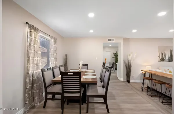 a room with furniture and a flat screen tv