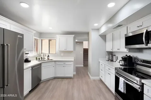 a living room with furniture and a couch