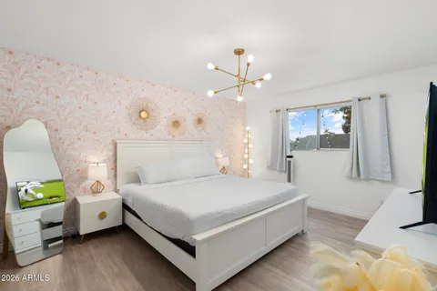 a view of swimming pool with a patio