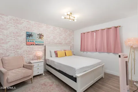 a view of a swimming pool with sitting area