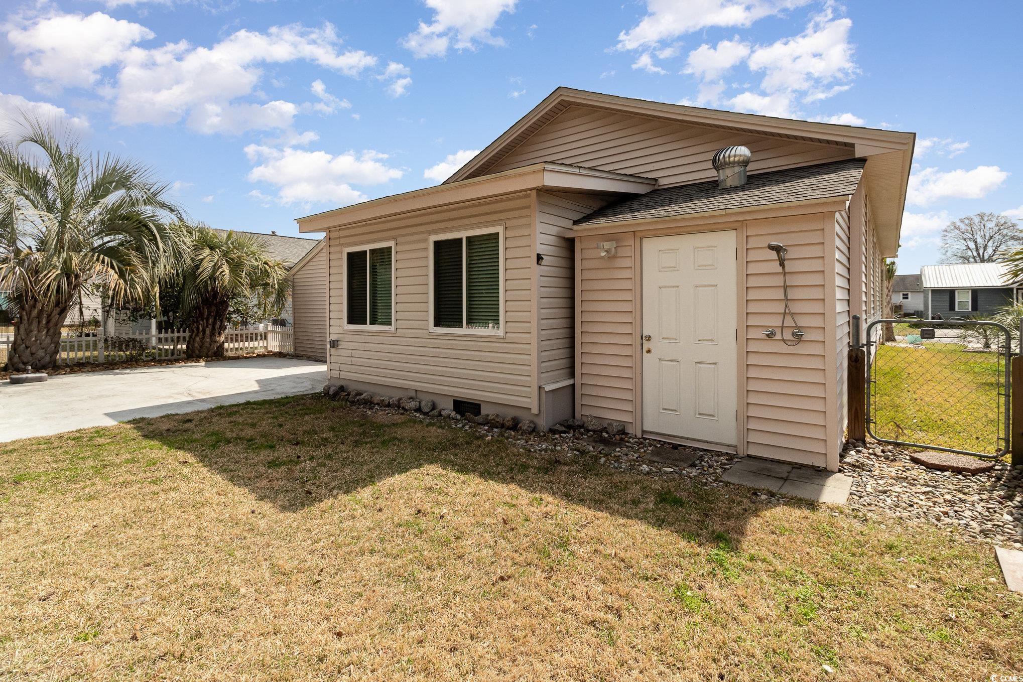 833 Main Sail Court Murrells Inlet, SC 29576 - Photo 21 of 40 Attached storage with outdoor shower