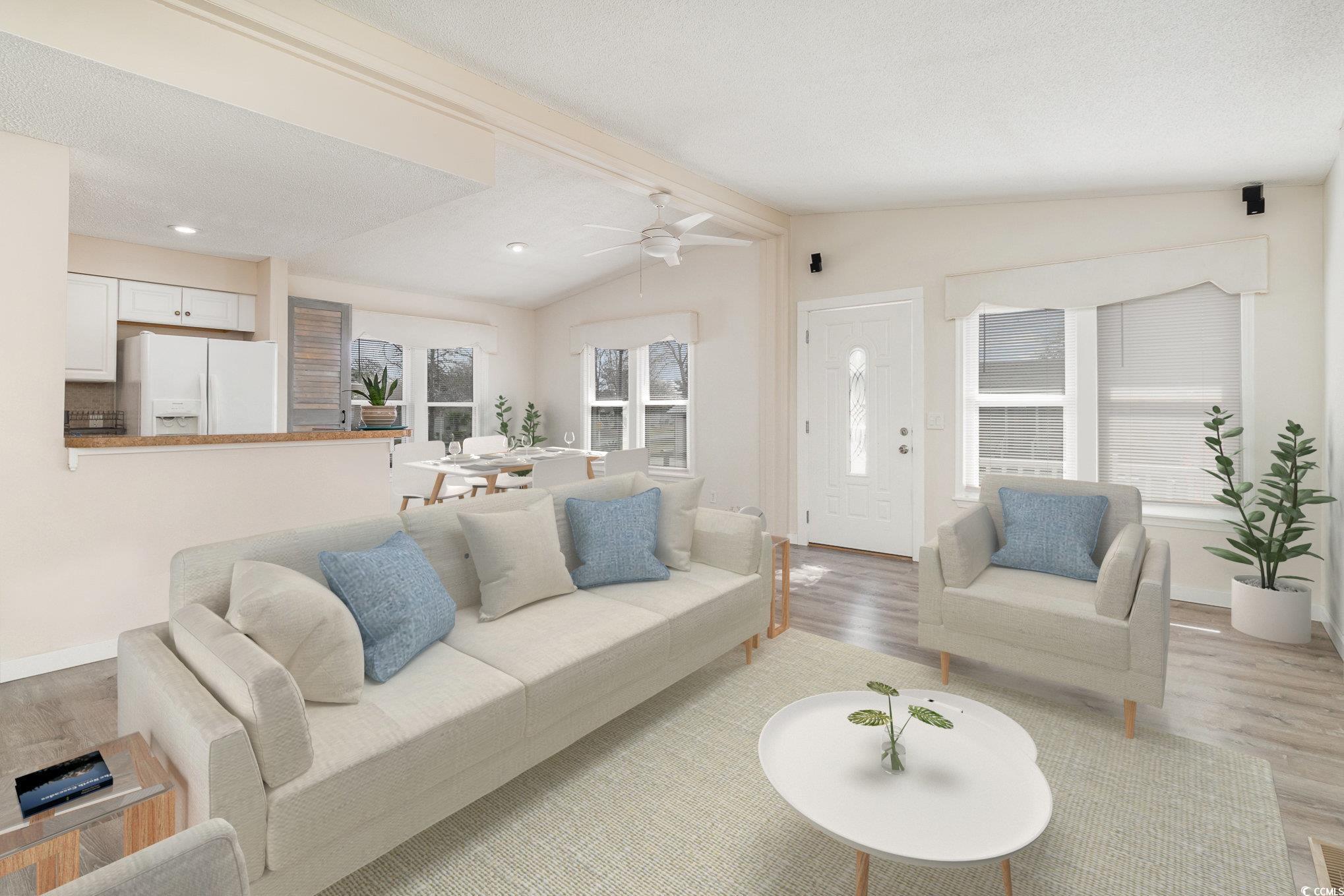 833 Main Sail Court Murrells Inlet, SC 29576 - Photo 3 of 40 Living room featuring lofted ceiling with beams, l