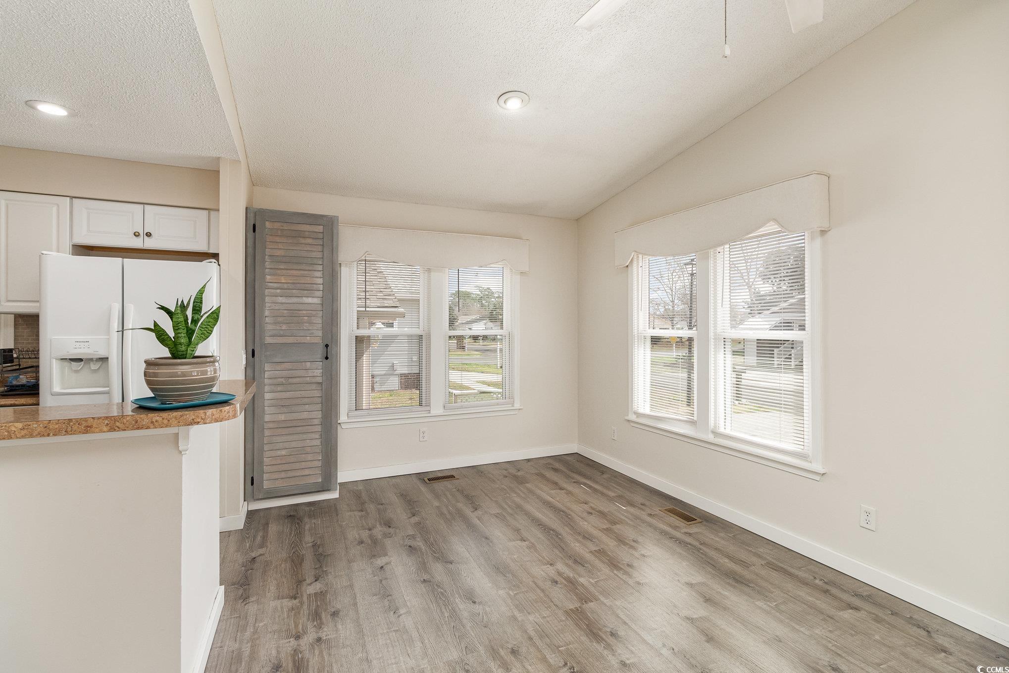 833 Main Sail Court Murrells Inlet, SC 29576 - Photo 5 of 40 Unfurnished dining area with visible vents, basebo