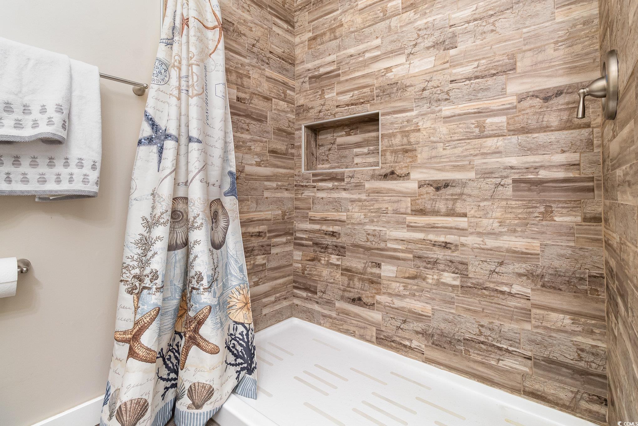 833 Main Sail Court Murrells Inlet, SC 29576 - Photo 7 of 40 Bathroom featuring a tile shower