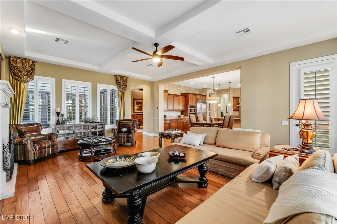 2709 Cyrano Street Henderson, NV 89044 - Photo 20 of 73 Expansive living room with stone fireplace.