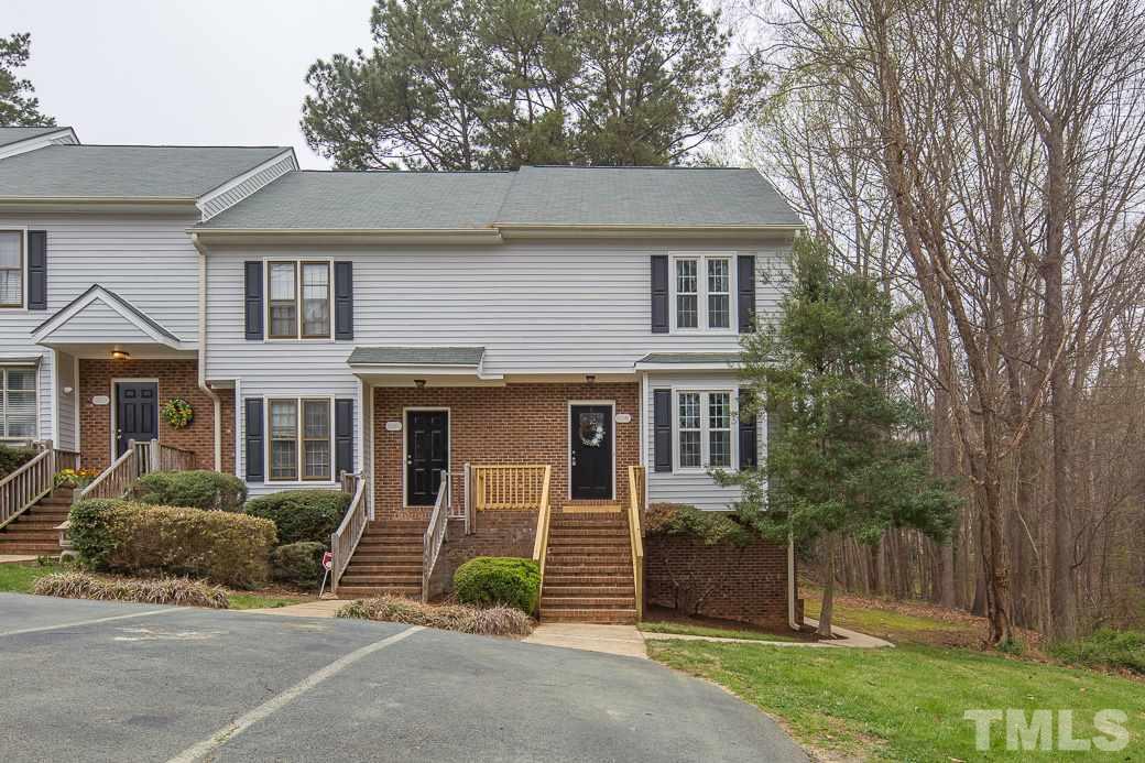 6241 Waterside Lane Raleigh, NC 27613 - Photo 14 of 16 a front view of a house with garden