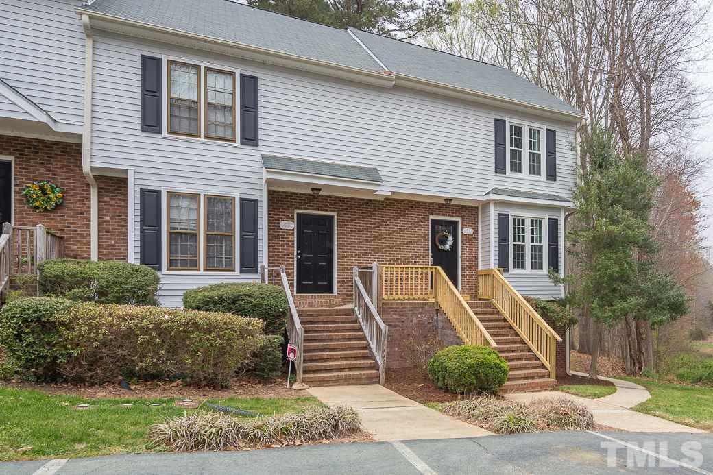 6241 Waterside Lane Raleigh, NC 27613 - Photo 15 of 16 a front view of a house with garden
