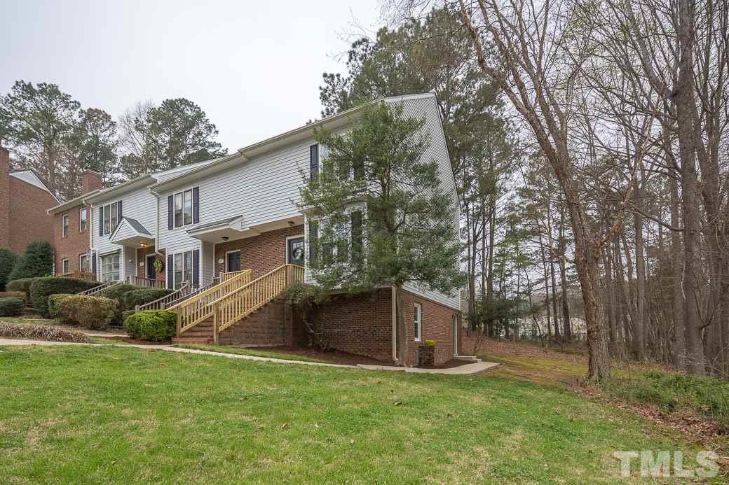 6241 Waterside Lane Raleigh, NC 27613 - Photo 16 of 16 a view of a back yard of the house