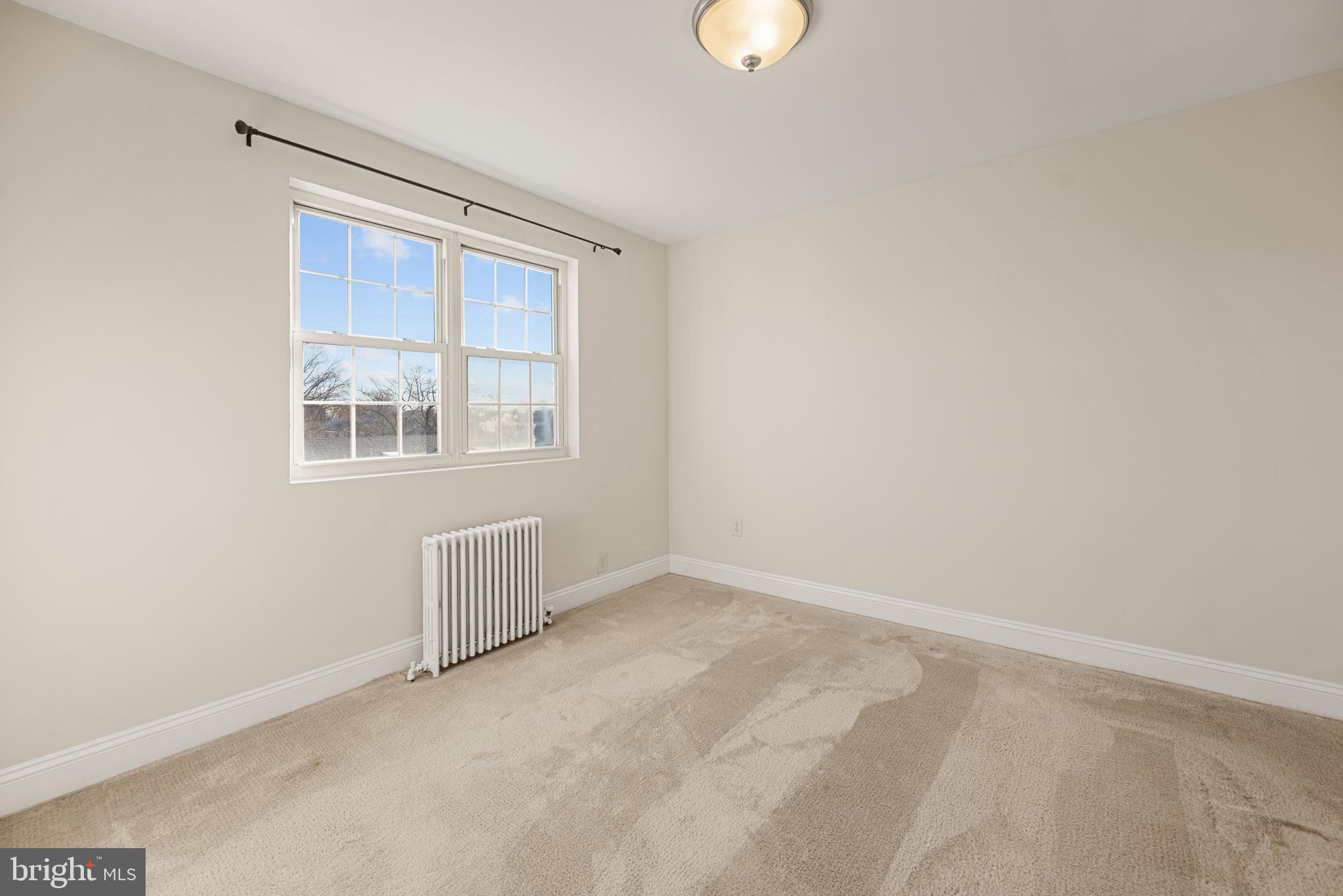 5310 8th Road South, Unit 8 Arlington, VA 22204 - Photo 12 of 22 an empty room with a window