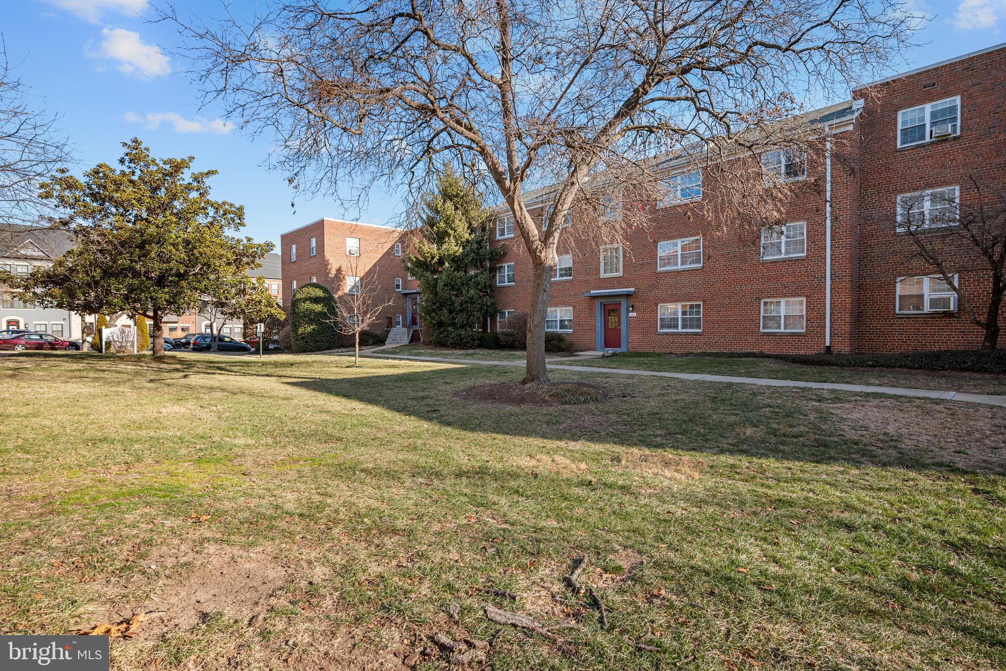 5310 8th Road South, Unit 8 Arlington, VA 22204 - Photo 17 of 22 a view of road with large trees