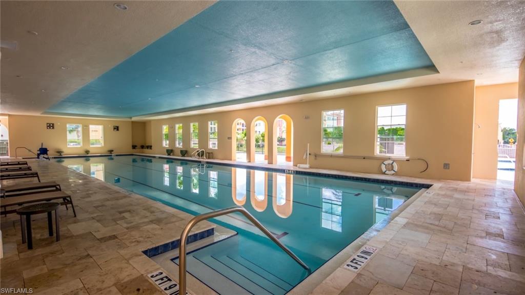 21490 Strada Nuova Circle, Unit D211 Estero, FL 33928 - Photo 42 of 45 a view of a living room and dining room