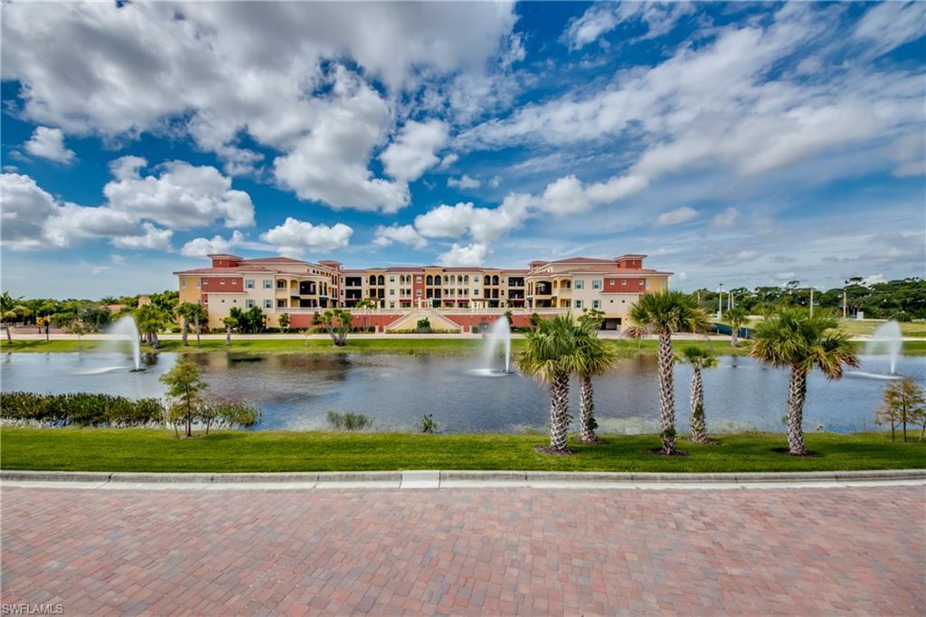 21490 Strada Nuova Circle, Unit D211 Estero, FL 33928 - Photo 45 of 45 a view of outdoor space with city view