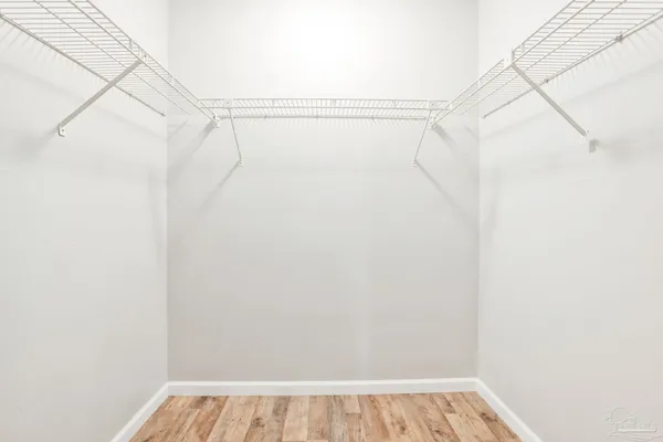a view of a room with racks on the wall