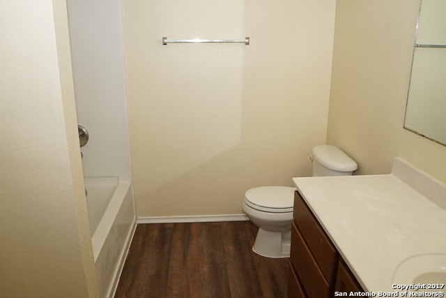 13202 Baldwin Ridge San Antonio, TX 78249 - Photo 18 of 20 a bathroom with a sink and a toilet