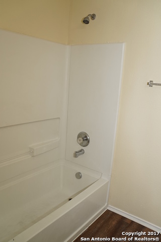 13202 Baldwin Ridge San Antonio, TX 78249 - Photo 19 of 20 a bathroom with a bathtub