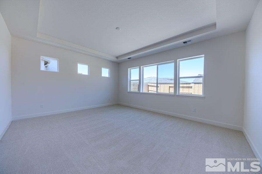 2345 Stone Rise Road, Unit SORRENTO TRAIL LOT #132 Reno, NV 89521 - Photo 9 of 11 a view of an empty room with a window