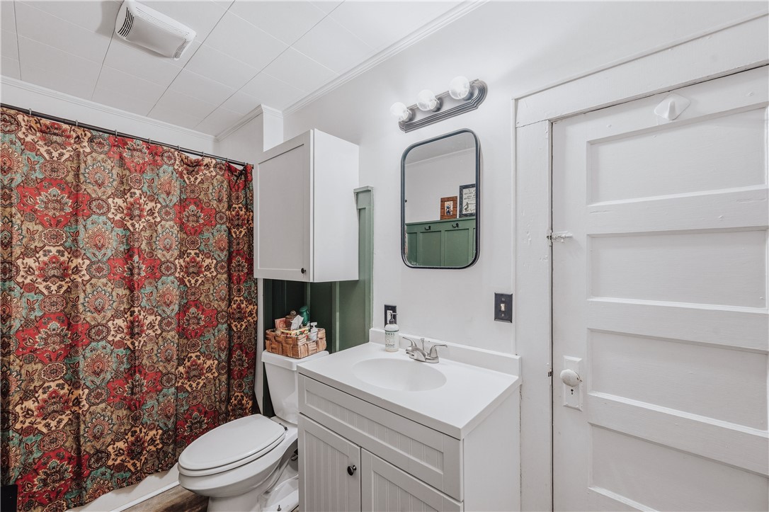 310 North Chestnut Street Seneca, SC 29678 - Photo 19 of 30 A well-appointed bathroom features a modern vanity and an inviting shower.