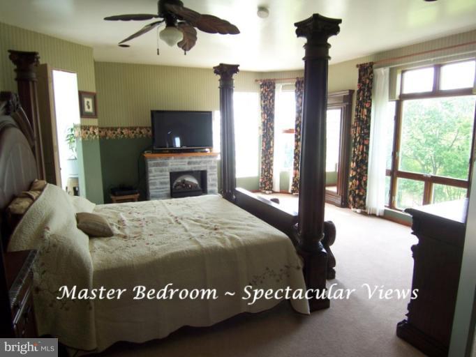 3015 Carrollton Road Finksburg, MD 21048 - Photo 22 of 30 a bed sitting in a bedroom next to a window