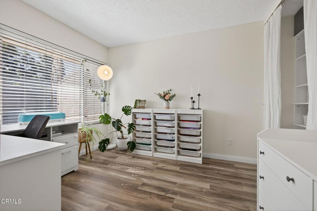 1213 Nilgai Place Ventura, CA 93003 - Photo 16 of 22 a bedroom with furniture and a large window