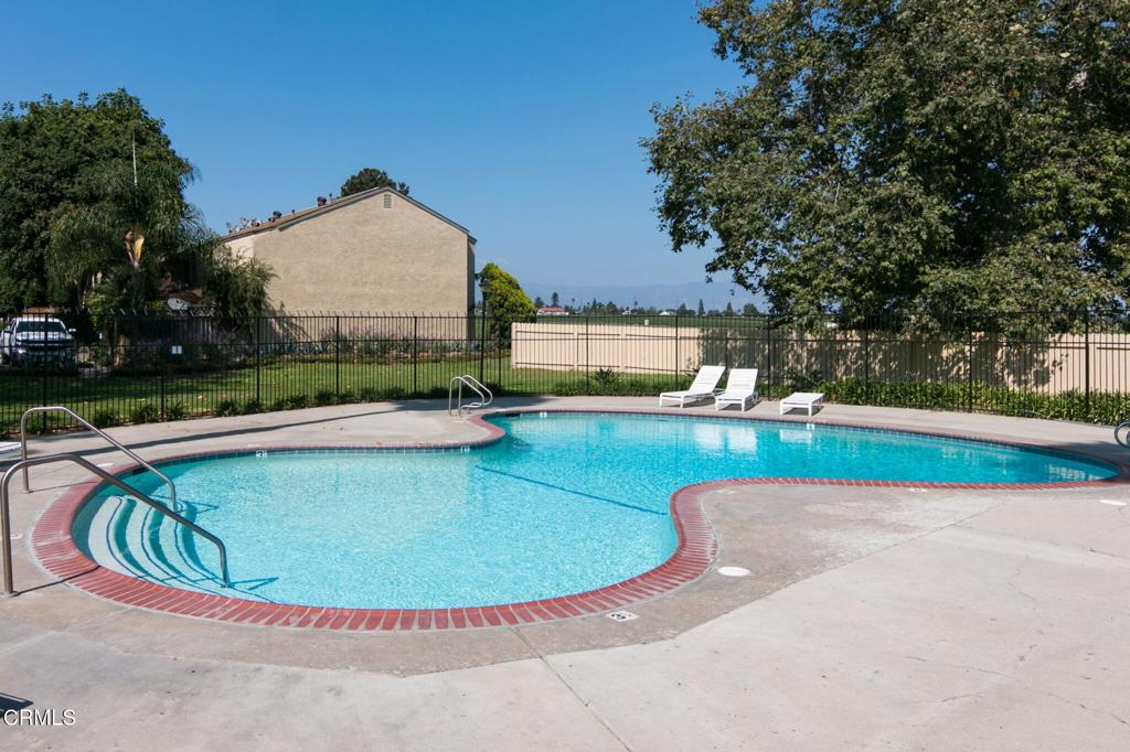 1213 Nilgai Place Ventura, CA 93003 - Photo 20 of 22 a view of a swimming pool with a yard