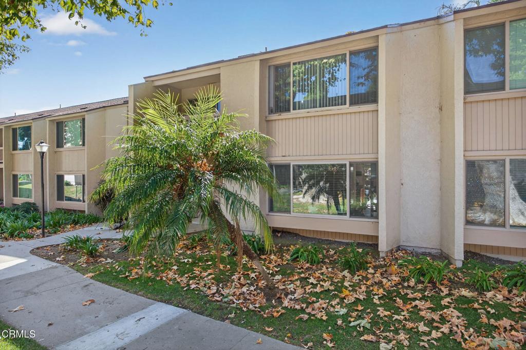 1213 Nilgai Place Ventura, CA 93003 - Photo 2 of 22 a front view of a house with garden