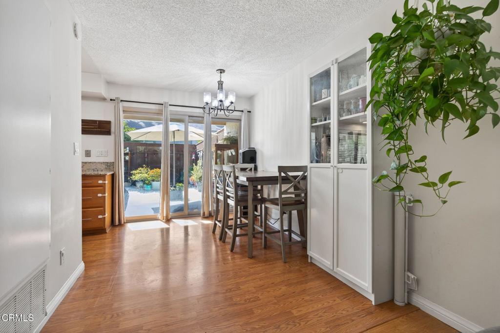1213 Nilgai Place Ventura, CA 93003 - Photo 6 of 22 a view of a dining room with furniture and chandelier