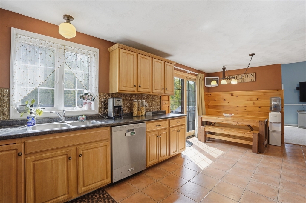 160 Gray Road Templeton, MA 01468 - Photo 13 of 42 a kitchen with kitchen island a sink a counter top space and appliances
