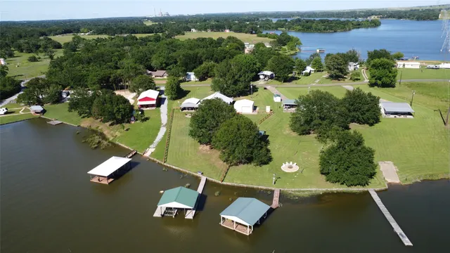 an aerial view of a house with a garden