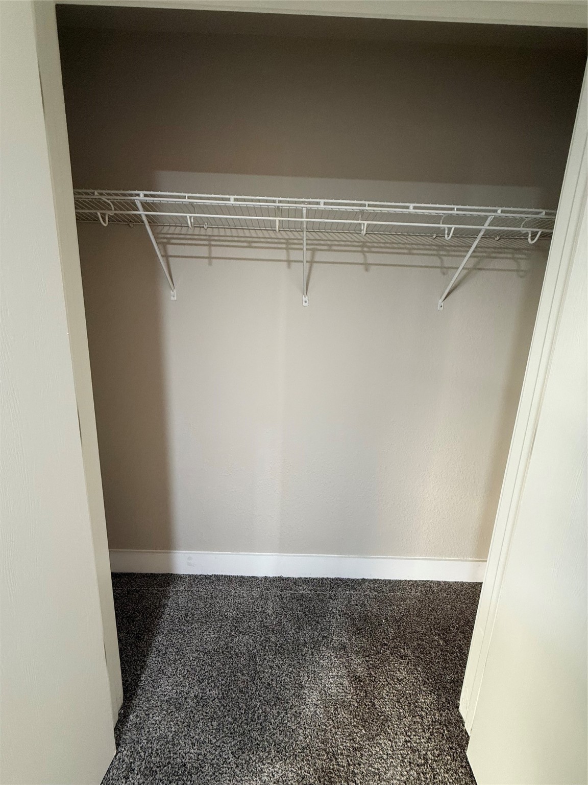 3819 Banks Ridge Lane Katy, TX 77449 - Photo 14 of 19 a view of a room with racks on the wall