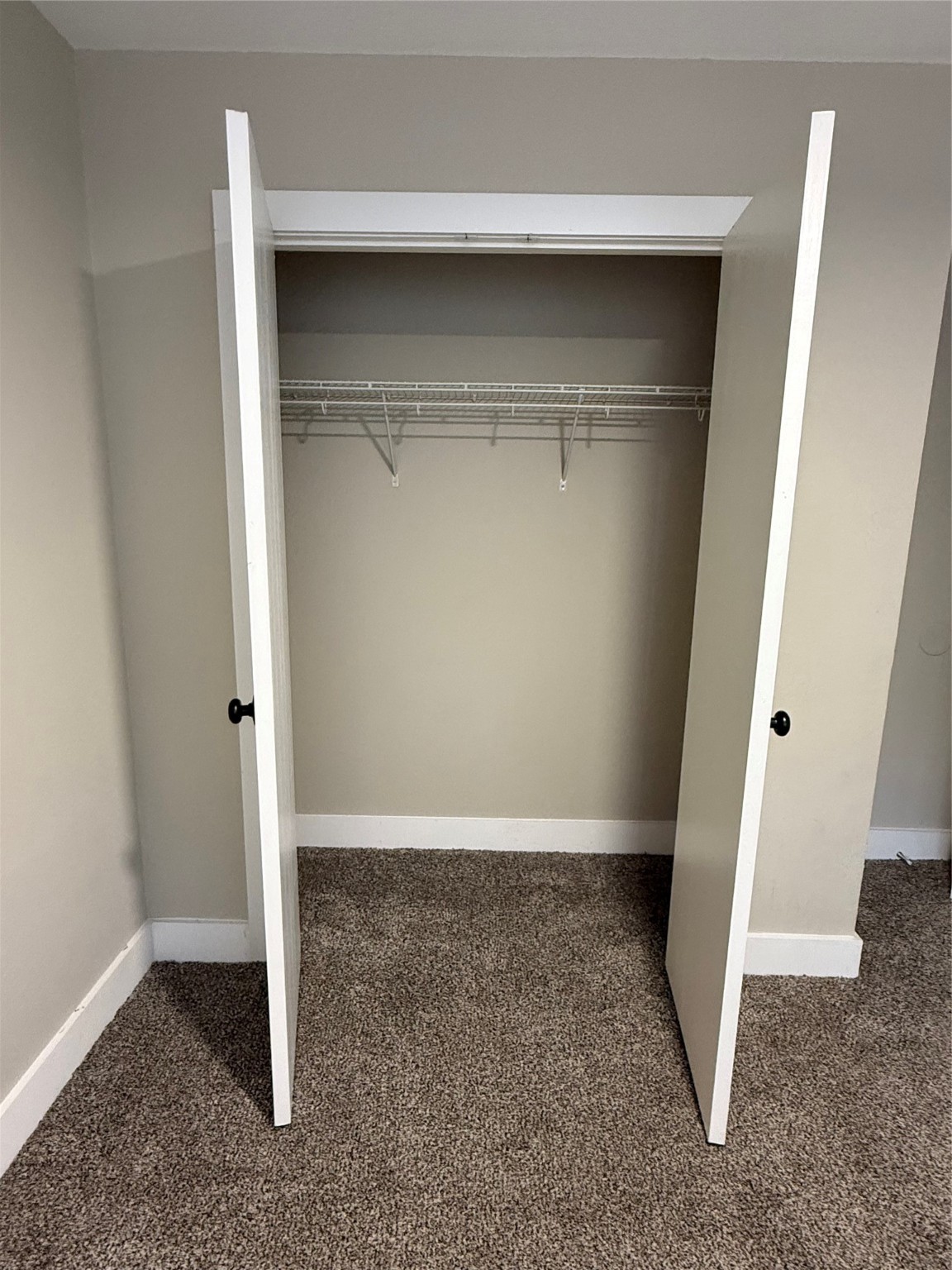 3819 Banks Ridge Lane Katy, TX 77449 - Photo 15 of 19 an empty room with a wooden closet